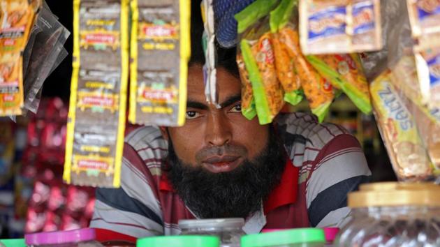 A man from the Rohingya community looks on as he sits inside his shop at a camp on the outskirts of Jammu.The United Nations has accused Myanmar of acting against the Rohingya with “genocidal intent,” a charge Myanmar refutes, saying its military did not use excessive force and was reacting to militant attacks. (Mukesh Gupta / REUTERS) A man from the Rohingya community looks on as he sits inside his shop at a camp on the outskirts of Jammu.The United Nations has accused Myanmar of acting against the Rohingya with “genocidal intent,” a charge Myanmar refutes, saying its military did not use excessive force and was reacting to militant attacks. (Mukesh Gupta / REUTERS)