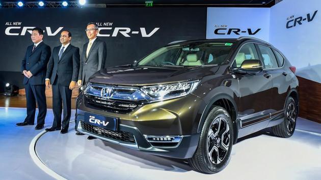 President & CEO of Honda Cars India, Gaku Nakanishi with Senior Vice President & Director-Marketing & Sales Rajesh Goel and Director, Sales & Marketing Makoto Hyoda at the launch of the all-new Honda CR-V in New Delhi. (Kamal Singh / PTI) President & CEO of Honda Cars India, Gaku Nakanishi with Senior Vice President & Director-Marketing & Sales Rajesh Goel and Director, Sales & Marketing Makoto Hyoda at the launch of the all-new Honda CR-V in New Delhi. (Kamal Singh / PTI)