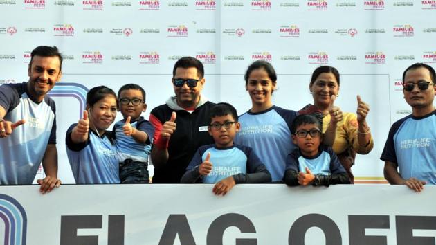 (From left) Shyamal Vallabhajee, Mery Kom, Ajay Khanna,Saina Nehwal during second edition of Herbal Nutrition India, second edition of Fit Families fest at Laxmi Lawns, Magarpatta in Pune,on October 7. (HT photo)