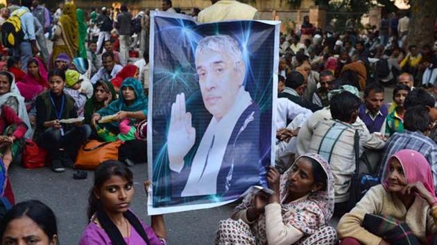 Devotees of self-styled godman Rampal Maharaj(AFP Photo) Devotees of self-styled godman Rampal Maharaj(AFP Photo)