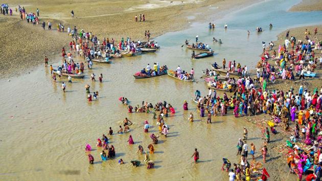 Devotees take a holy dip in the River Ganga on the first day of the Navratri festival in Allahabad, Uttar Pradesh. (PTI)