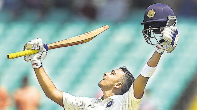 Rajkot: Indian batsman Prithvi Shaw celebrates his century on day one of the 1st test cricket match against West Indies, in Rajkot. (PTI) Rajkot: Indian batsman Prithvi Shaw celebrates his century on day one of the 1st test cricket match against West Indies, in Rajkot. (PTI)