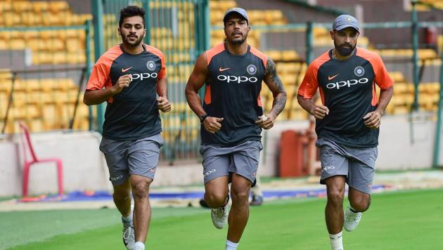 File photo of Mohammed Shami, Umesh Yadav and Shardul Thakur during a practice session.(PTI)