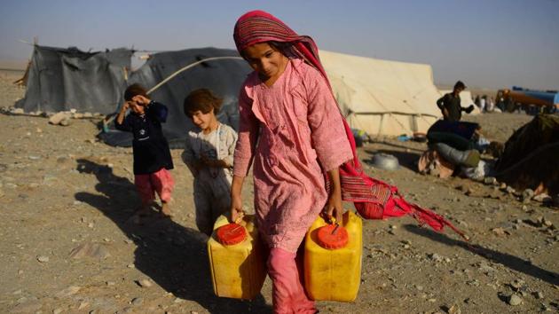 People at the camps told AFP they have been surviving on a diet of bread and tea for months because they do not have enough money to buy fruit, vegetables or meat. More than 70% of displaced families in the west do not have enough to eat and 33,200 acutely malnourished children under the age of five need “life-saving treatment”, OCHA reported. (Hoshang Hashimi / AFP) People at the camps told AFP they have been surviving on a diet of bread and tea for months because they do not have enough money to buy fruit, vegetables or meat. More than 70% of displaced families in the west do not have enough to eat and 33,200 acutely malnourished children under the age of five need “life-saving treatment”, OCHA reported. (Hoshang Hashimi / AFP)