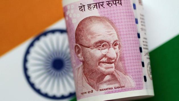 The rupee dropped to a historic low of 74.45 against US dollar. (Reuters File Photo) The rupee dropped to a historic low of 74.45 against US dollar. (Reuters File Photo)