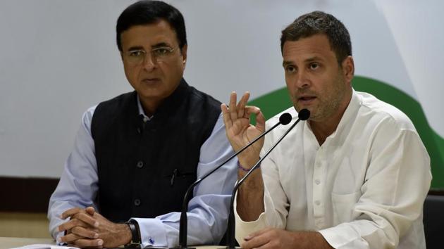 Congress President Rahul Gandhi addresses a press conference over the Rafale deal as senior spokesperson Randeep Singh Surjewala looks on at AICC headquarters in New Delhi. Rahul Gandhi called the Rs 59,000 crore deal for 36 fighter jets a “clear-cut case of corruption” and accused the government of a cover up. (Mohd Zakir / HT Photo)