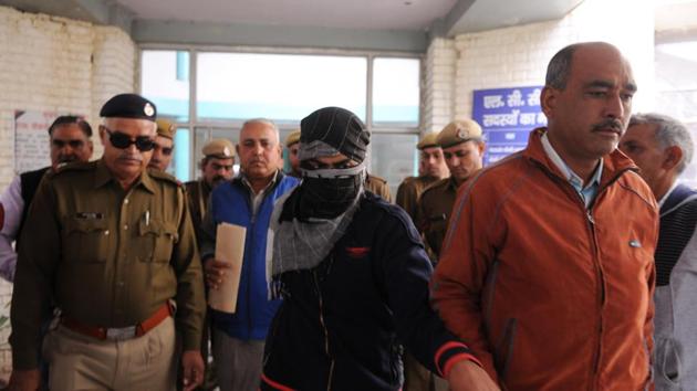 The CBI escorts the 16-year-old student, accused of killing a seven-year-old boy at a private school in Gurgaon over a year ago. (Parveen Kumar/Hindustan Times) The CBI escorts the 16-year-old student, accused of killing a seven-year-old boy at a private school in Gurgaon over a year ago. (Parveen Kumar/Hindustan Times)