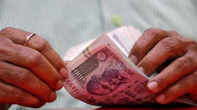 The rupee on Thursday fell by by 24 paise to hit another low of 74.45 against the US dollar .(Reuters file photo) The rupee on Thursday fell by by 24 paise to hit another low of 74.45 against the US dollar .(Reuters file photo)
