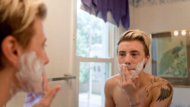 Harrison applies shaving foam in 2012. “I started shaving before any hair had shown itself, because I wanted more to grow. Shaving is a wonderful feeling until you start actually growing hair, then it's painful and you break out, but I’ve always wanted a beard,” Harrison said. He added that he longed to feel more comfortable in his own body and wanted to have certain masculine features such as a flat chest. (Sara Swaty / REUTERS) Harrison applies shaving foam in 2012. “I started shaving before any hair had shown itself, because I wanted more to grow. Shaving is a wonderful feeling until you start actually growing hair, then it's painful and you break out, but I’ve always wanted a beard,” Harrison said. He added that he longed to feel more comfortable in his own body and wanted to have certain masculine features such as a flat chest. (Sara Swaty / REUTERS)