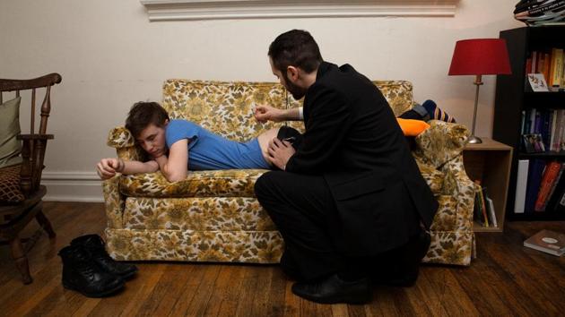 Harrison, 22, reacts as his friend George gives him a testosterone shot in 2011. As he started his hormone therapy, his friends met for the first months of injections, in celebration and to help him get comfortable with the process. “When I first started it was painful and scary because I’ve never liked needles or shots, but you just get used to it. It’s everyday life now,” he said. (Sara Swaty / REUTERS) Harrison, 22, reacts as his friend George gives him a testosterone shot in 2011. As he started his hormone therapy, his friends met for the first months of injections, in celebration and to help him get comfortable with the process. “When I first started it was painful and scary because I’ve never liked needles or shots, but you just get used to it. It’s everyday life now,” he said. (Sara Swaty / REUTERS)