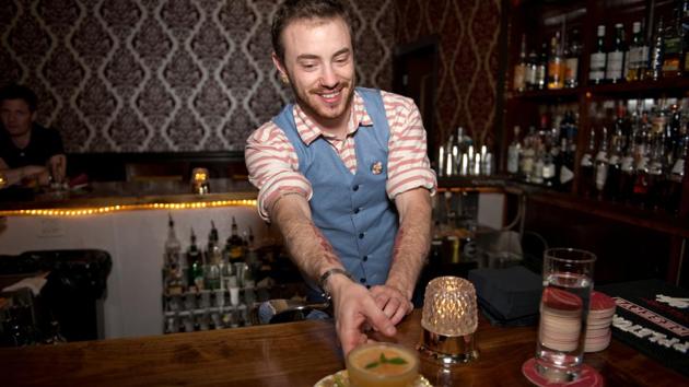 Harrison Massie, 27, serves a cocktail working at Planter's House in 2017. “When I first started transitioning I couldn’t find a job for the life of me. Anytime I tried to explain to an interviewer that my deadname (pre-transition name) wasn’t the name I went by, they just got confused and wouldn’t hire me,” Harrison said. “Craft bartending is finally a place where I can express myself and finally be appreciated.” (Sara Swaty / REUTERS) Harrison Massie, 27, serves a cocktail working at Planter's House in 2017. “When I first started transitioning I couldn’t find a job for the life of me. Anytime I tried to explain to an interviewer that my deadname (pre-transition name) wasn’t the name I went by, they just got confused and wouldn’t hire me,” Harrison said. “Craft bartending is finally a place where I can express myself and finally be appreciated.” (Sara Swaty / REUTERS)