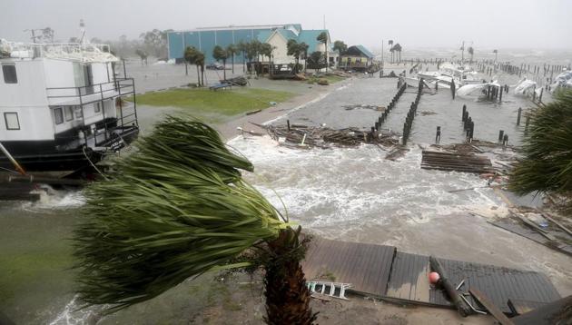 Boats lay sunk and damaged at the Port St. Joe Marina, Wednesday, Oct. 10, 2018 in Port St. Joe, Florida. (AP) Boats lay sunk and damaged at the Port St. Joe Marina, Wednesday, Oct. 10, 2018 in Port St. Joe, Florida. (AP)