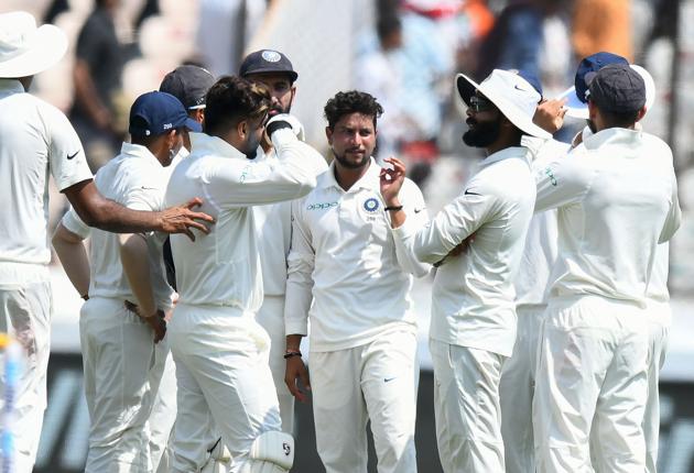 Indian cricketer Kuldeep Yadav (C) celebrates with teammates the wicket of West Indies cricketer Kraigg Brathwaite during the first day's play of the second Test cricket match between India and West Indies at the Rajiv Gandhi International Cricket Stadium in Hyderabad (AFP) Indian cricketer Kuldeep Yadav (C) celebrates with teammates the wicket of West Indies cricketer Kraigg Brathwaite during the first day's play of the second Test cricket match between India and West Indies at the Rajiv Gandhi International Cricket Stadium in Hyderabad (AFP)