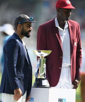 Indian cricket captain Virat Kohli and West Indies Captain Jason Holder pose with the Test series cup during the first day's play of the second Test cricket match between India and West Indies at the Rajiv Gandhi International Cricket Stadium in Hyderabad (AFP) Indian cricket captain Virat Kohli and West Indies Captain Jason Holder pose with the Test series cup during the first day's play of the second Test cricket match between India and West Indies at the Rajiv Gandhi International Cricket Stadium in Hyderabad (AFP)