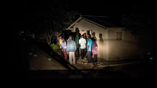 Community members wielding machetes and sticks search for ADF rebels in looted houses. “The civilians get frustrated with us and MONUSCO, sometimes we arrive late, we have to fight harder to help the community change its mind about us,” one of the Congolese soldiers said on condition of anonymity. (John Wessels / AFP)
