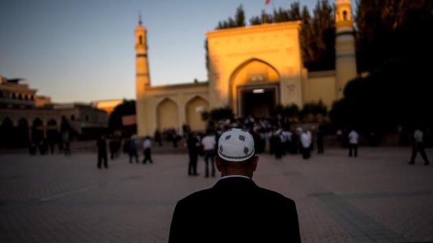A Muslim man arriving at the Id Kah Mosque for morning prayer during Eid al-Fitr in Kashgar in China's Xinjiang Uighur Autonomous Region. (AFP File Photo/Representative image) A Muslim man arriving at the Id Kah Mosque for morning prayer during Eid al-Fitr in Kashgar in China's Xinjiang Uighur Autonomous Region. (AFP File Photo/Representative image)