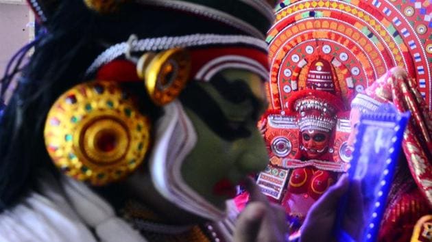 Artists get ready ahead of a Kathakali performance at Park Sheraton, organised by Kerala tourism in Pune, Maharashtra. (Shankar Narayan / HT Photo)