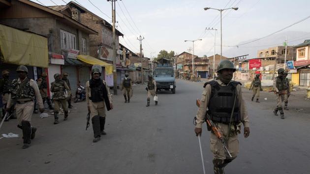 Shops, public transport, businesses and educational institutions remained closed, skeletal private transport though moved in Srinagar city roads.(AP)