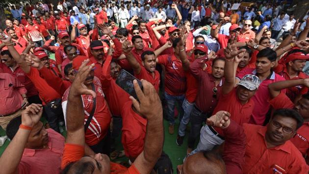 Members of Northern Railwaymen's Union (NRMU) during a protest by railway drivers and guards of All India Railwaymen’s Federation (AIRF) at the Parliament Street in New Delhi. They were protesting over the running allowance, for upliftment and justice on their grade pay, basic facilities in Engine Cab and Guards running rooms and the more than 12 hours of continuous duties. (Biplov Bhuyan / HT Photo) Members of Northern Railwaymen's Union (NRMU) during a protest by railway drivers and guards of All India Railwaymen’s Federation (AIRF) at the Parliament Street in New Delhi. They were protesting over the running allowance, for upliftment and justice on their grade pay, basic facilities in Engine Cab and Guards running rooms and the more than 12 hours of continuous duties. (Biplov Bhuyan / HT Photo)