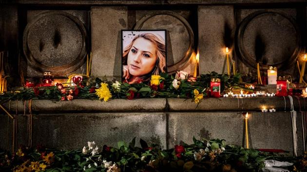 A portrait of slain Bulgarian television journalist Viktoria Marinova during in a candle-light vigil in the city of Rousse. Corruption-plagued EU member Bulgaria found itself under pressure to find the killer of the television journalist whose brutal murder at the weekend shocked the country and sparked international condemnation. (Dimitar Dilkoff / AFP)