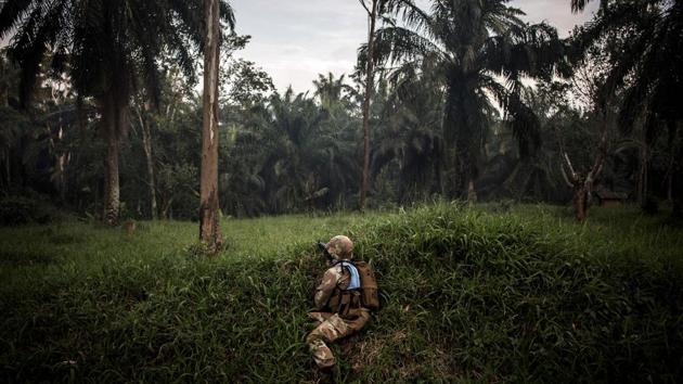“This is my fourth deployment in the DRC, my first was in 2006,” said UN peacekeeper Maijeke. “This is the most intense deployment for me, I am always anticipating an attack,” he added. “The biggest difference this time is the escalation in the killings of civilians, this is heartbreaking for me, a serious concern.” (John Wessels / AFP)