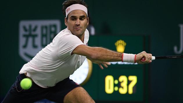 Switzerland's Roger Federer hits a return against Spain's Roberto Bautista Agut during their men's singles third round match at the Shanghai Masters tennis tournament. (AF) Switzerland's Roger Federer hits a return against Spain's Roberto Bautista Agut during their men's singles third round match at the Shanghai Masters tennis tournament. (AF)