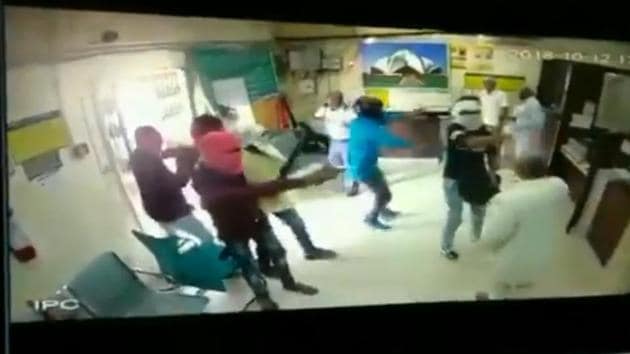 A police officer said initial inquiry revealed that four armed men entered the bank around 3.30pm and overpowered the guard while their two associates stood outside with two motorcycles.(ANI/Video screenshot)