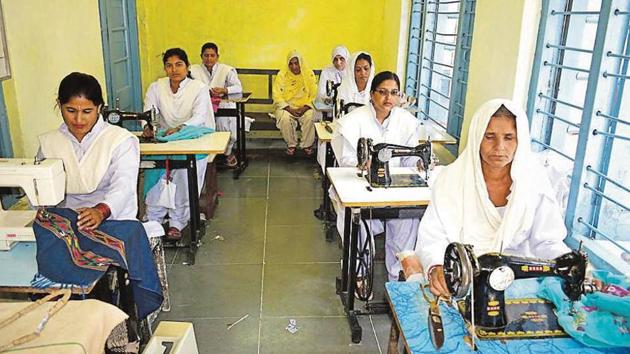 Women inmates engaged in sewing work at Kanda Jail in Shimla on Friday.(HT Photo)