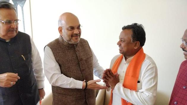 Congress Chhattisgarh working president and Pali-Tanakhar MLA Ramdayal Uike joins the BJP in the presence of Amit Shah and state chief minister Raman Singh on October 13. (Twitter/BJP Chhattisgarh) Congress Chhattisgarh working president and Pali-Tanakhar MLA Ramdayal Uike joins the BJP in the presence of Amit Shah and state chief minister Raman Singh on October 13. (Twitter/BJP Chhattisgarh)