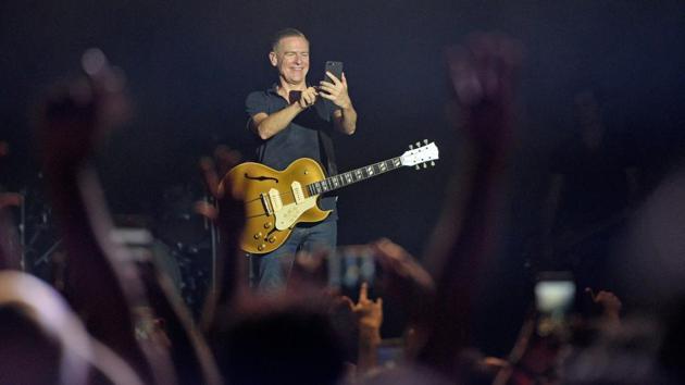 Canadian singer Bryan Adams takes in the crowd during ‘The Ultimate Tour’ live at Jio Garden, BKC in Mumbai, Maharashtra. (Satyabrata Tripathy / HT Photo)