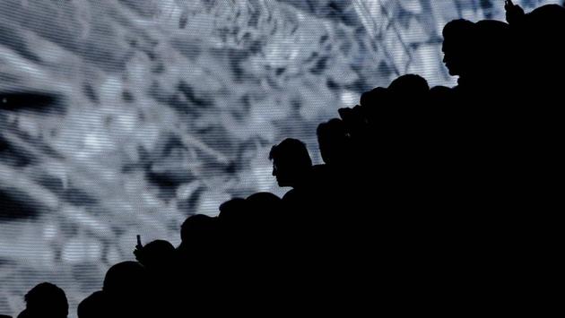 Spectators watch creations by designer Rajesh Pratap Singh during the Lotus Makeup India Fashion Week Spring Summer 2019 in New Delhi, India. (Chandan Khanna / AFP)