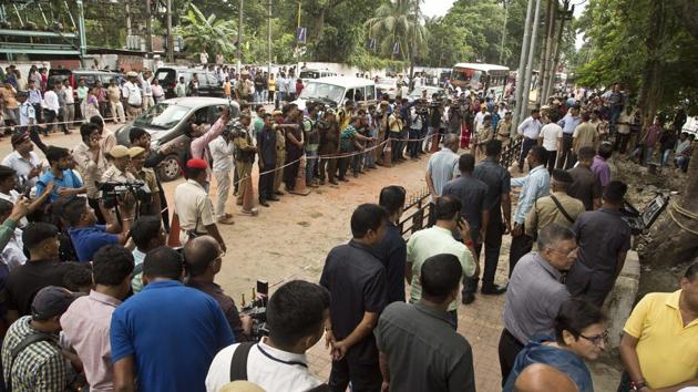 A crowd gathers at the site of an explosion near a busy market in Guwahati, India, Saturday, Oct. 13, 2018. The explosion took place outside the office of a district magistrate, but it is unclear whether the official was the target, said senior police officer Harmeet Singh.(AP)