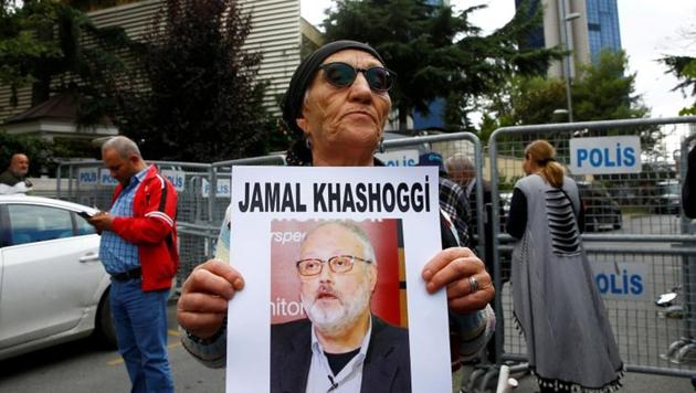 A human rights activist holds picture of Saudi journalist Jamal Khashoggi during a protest outside the Saudi Consulate in Istanbul, Turkey on October 9, 2018. (Reuters) A human rights activist holds picture of Saudi journalist Jamal Khashoggi during a protest outside the Saudi Consulate in Istanbul, Turkey on October 9, 2018. (Reuters)