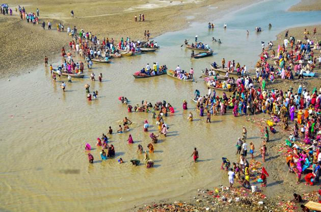 Devotees take a holy dip in River Ganga on the first day of the Navratri festival in Allahabad on October 10.(PTI File Photo)