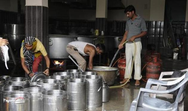 Mid day meal being prepared for an Anganwadi school in New Delhi, July 18. Much like many other schemes, Anganwadi too faces a problem of inadequate resource allocation. In the Anganwadi and ICDS at least ₹34,575 crores should be allocated as against the expenditure of ₹14,632 crores in 2016-17. (HT) Mid day meal being prepared for an Anganwadi school in New Delhi, July 18. Much like many other schemes, Anganwadi too faces a problem of inadequate resource allocation. In the Anganwadi and ICDS at least ₹34,575 crores should be allocated as against the expenditure of ₹14,632 crores in 2016-17. (HT)