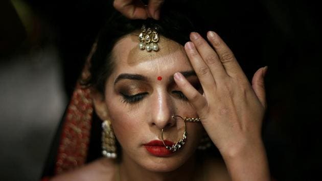 A contestant prepares backstage before the Miss Transqueen India 2018 transgender beauty pageant in Mumbai, Maharashtra. (Francis Mascarenhas / REUTERS)