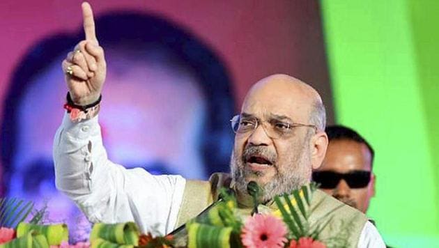 BJP chief Amit Shah addresses party workers in Hoshangabad, Madhya Pradesh on Sunday.(PTI Photo)