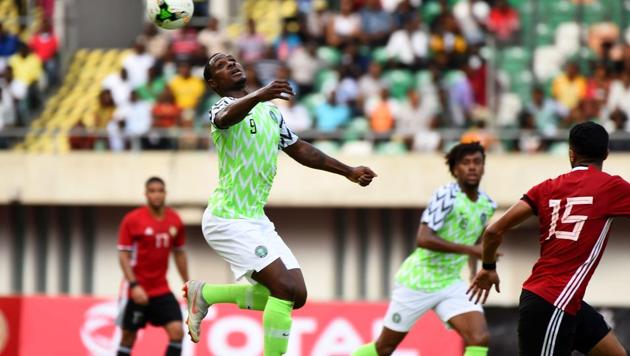 Nigerian forward Odion Ighalo (C) heads to control the ball during the African Cup of Nations qualification match between Nigeria and Libya in Uyo (AFP) Nigerian forward Odion Ighalo (C) heads to control the ball during the African Cup of Nations qualification match between Nigeria and Libya in Uyo (AFP)
