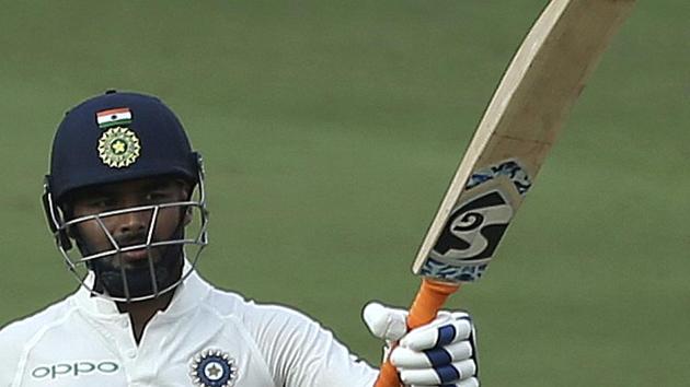 Indian cricketer Rishabh Pant celebrates scoring fifty runs during the second day of the second cricket test match between India and West Indies in Hyderabad, India, Saturday, Oct. 13, 2018. (AP Photo/Mahesh Kumar A.) (AP) Indian cricketer Rishabh Pant celebrates scoring fifty runs during the second day of the second cricket test match between India and West Indies in Hyderabad, India, Saturday, Oct. 13, 2018. (AP Photo/Mahesh Kumar A.) (AP)