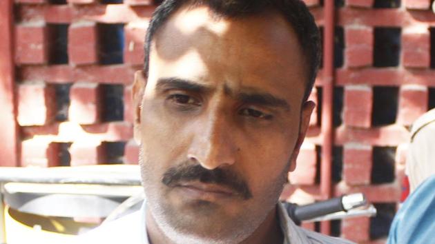 The accused Mahipal Singh, a head constable, who was arrested on Saturday evening was terminated from the police department and sent to police custody for four days by a city court on Sunday(Yogendra Kumar/HT Photo)