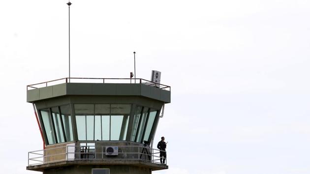 An Albanian military member is pictured at the air traffic control tower. “The region as a whole has entered into an irreversible Euro-Atlantic integration process,” Xhacka added. News of a NATO base has stirred hopes in Kucova. (Florion Goga / REUTERS) An Albanian military member is pictured at the air traffic control tower. “The region as a whole has entered into an irreversible Euro-Atlantic integration process,” Xhacka added. News of a NATO base has stirred hopes in Kucova. (Florion Goga / REUTERS)
