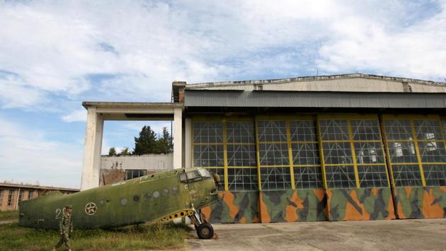 An Albanian Air Force member walks near an old non-functioning Airplane (Antonov An-2 ) at Kucova Air Base. Albania retired its 224 Soviet- and Chinese-made MiGs in 2005, and since 2009 NATO neighbours Italy and Greece monitor its airspace. That led to economic decline in and around Kucova, which was called “Stalin City” during the era of Communist rule. (Florion Goga / REUTERS) An Albanian Air Force member walks near an old non-functioning Airplane (Antonov An-2 ) at Kucova Air Base. Albania retired its 224 Soviet- and Chinese-made MiGs in 2005, and since 2009 NATO neighbours Italy and Greece monitor its airspace. That led to economic decline in and around Kucova, which was called “Stalin City” during the era of Communist rule. (Florion Goga / REUTERS)