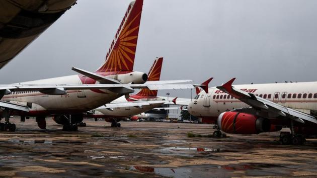 Air India planes are kept in the tarmac at the IGI airport in New Delhi on September 1.(AFP Photo)