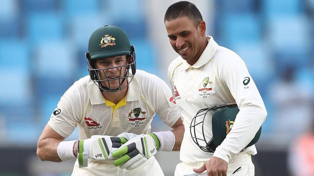 Tim Paine of Australia speaks with Usman Khawaja of Australia during day five of the First Test match in the series between Australia and Pakistan at Dubai International Stadium on October 11, 2018 in Dubai, United Arab Emirates. (Getty Images) Tim Paine of Australia speaks with Usman Khawaja of Australia during day five of the First Test match in the series between Australia and Pakistan at Dubai International Stadium on October 11, 2018 in Dubai, United Arab Emirates. (Getty Images)
