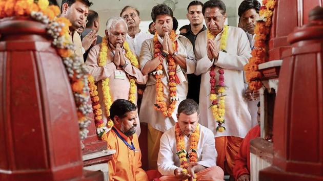 Congress president Rahul Gandhi offers prayers at Pitambara Peeth in Datia on October 15. (PTI Photo) Congress president Rahul Gandhi offers prayers at Pitambara Peeth in Datia on October 15. (PTI Photo)