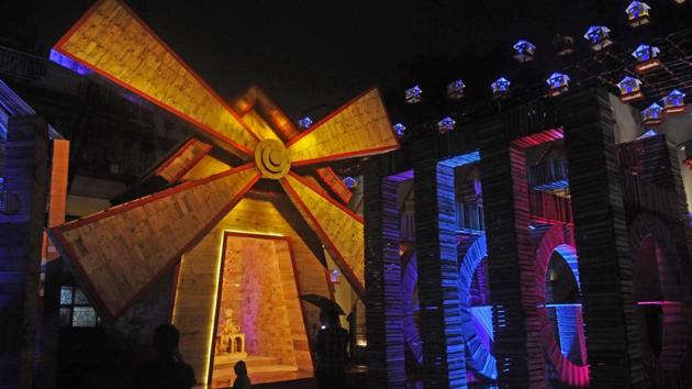 Selimpur Pally Durga Puja’s pandal in South Kolkata is themed on rebirth after death. The artist has used the wind mill, pages from a calendar, kite-spools as motifs to symbolise the cycle of birth, death and rebirth. (Samir Jana / HT Photo) Selimpur Pally Durga Puja’s pandal in South Kolkata is themed on rebirth after death. The artist has used the wind mill, pages from a calendar, kite-spools as motifs to symbolise the cycle of birth, death and rebirth. (Samir Jana / HT Photo)