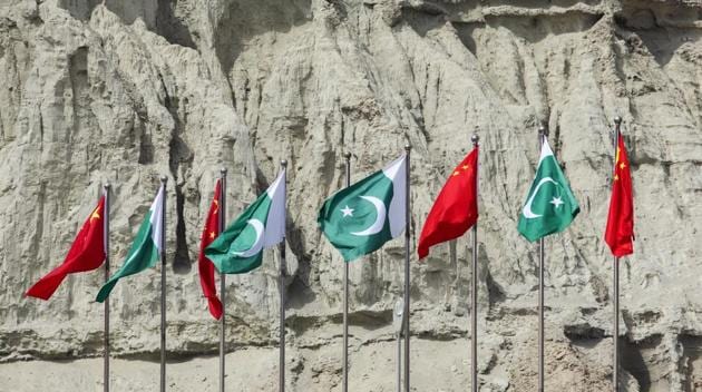 Chinese national flags fly next to Pakistani national flags at the Gwadar port in Gwadar, in Balochistan, Pakistan. (Bloomberg Photo) Chinese national flags fly next to Pakistani national flags at the Gwadar port in Gwadar, in Balochistan, Pakistan. (Bloomberg Photo)