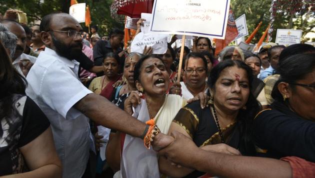 Members of Sabarimala Ayyappa Seva Samajam (SASS) take part in a protest against Supreme Court verdict on the entry of women of all ages into the Sabarimala Lord Ayyappa Temple, at Jantar Mantar in New Delhi, on October 7, 2018.(Biplov Bhuyan/ HT Photo) Members of Sabarimala Ayyappa Seva Samajam (SASS) take part in a protest against Supreme Court verdict on the entry of women of all ages into the Sabarimala Lord Ayyappa Temple, at Jantar Mantar in New Delhi, on October 7, 2018.(Biplov Bhuyan/ HT Photo)