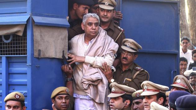 On Tuesday, a local court in Haryana’s Hisar sentenced self-styled godman Rampal to life imprisonment in connection with a murder case against him. The court of additional district and sessions judge (ADJ) DR Chalia pronounced the verdict in the 2014 case. (Kapil Sethi / AP File)