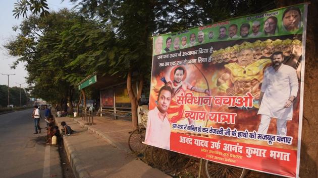 A poster in Patna showing RJD leader Tejashwi Prasad Yadav as Ram and chief minister Nitish Kumar as Ravan has sparked off a political row(HT Photo)